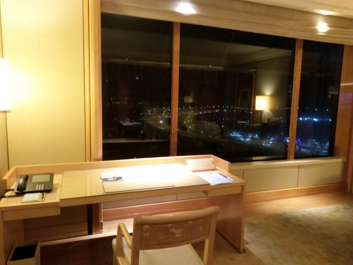 ritz carlton singapore Work Desk and view of Kallang Bay plus Benjamin Sheares Bridge
