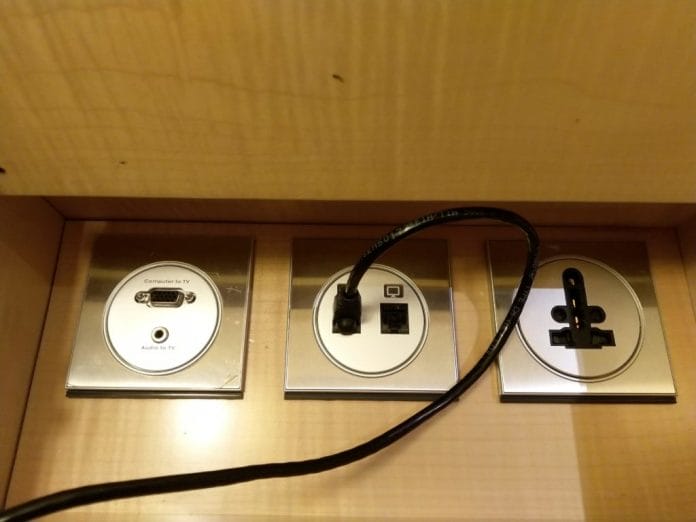 ritz carlton singapore VGA port, AUX port as well as the LAN ports for the in-room phone and a multi-socket power port
