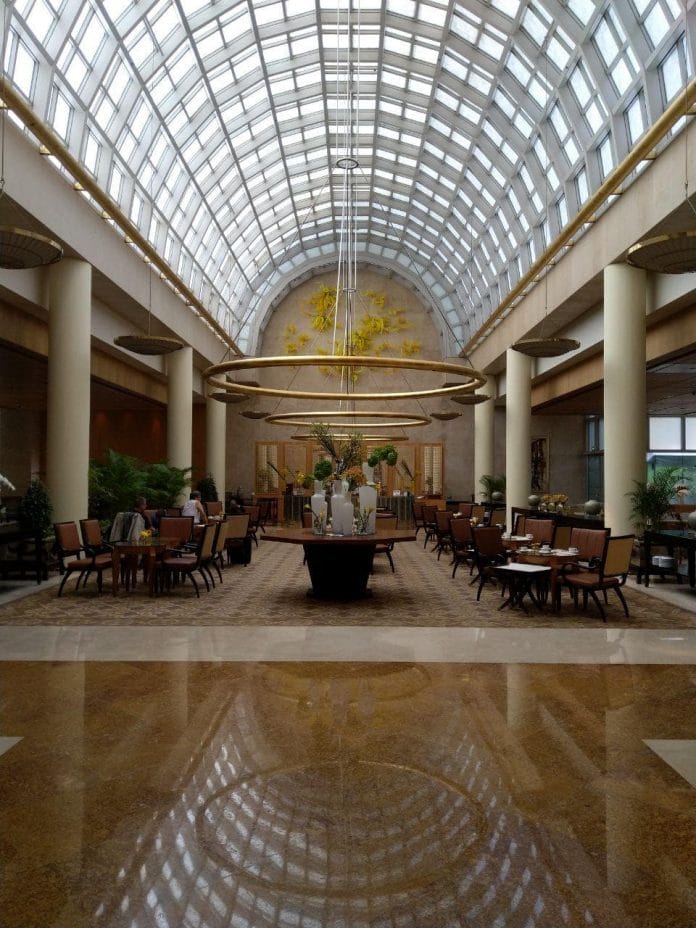 ritz carlton singapore Lobby lounge of The Ritz-Carlton Millenia Singapore, located beside the check-in desks