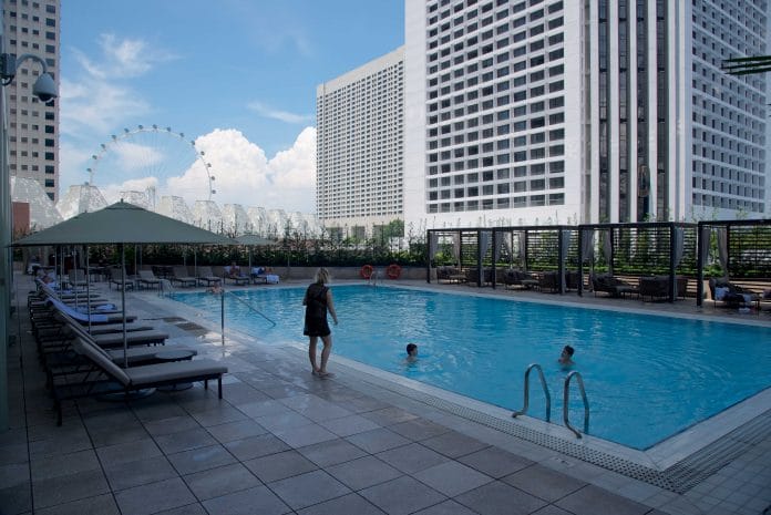 Open-air swimming pool, with views of the Singapore Flyer