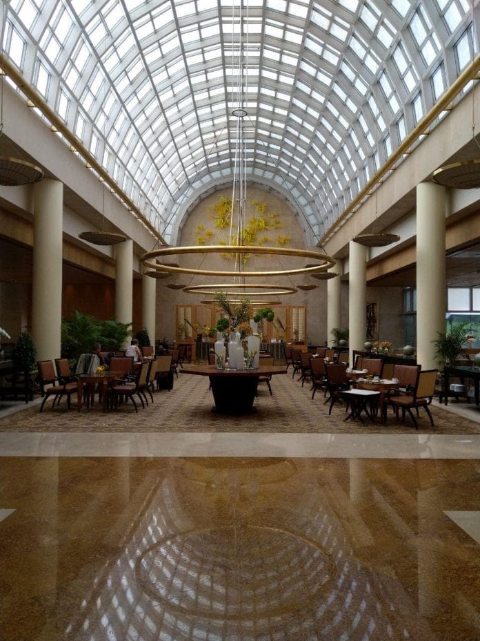 Lobby lounge of The Ritz-Carlton Millenia Singapore, located beside the check-in desks