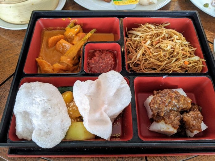 "Bento box" bee hoon with vegetable curry, fruit rojak and rice cake